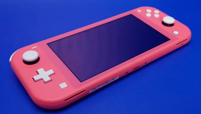 Набор Консоль Nintendo Switch Lite 32GB (045496453176) Coral + Игра The Legend of Zelda Breath of The Wild Русская Озвучка